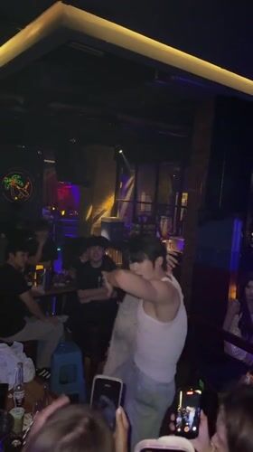 Nightlife scene at a Liangjiang club and surrounding streets