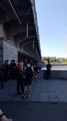 Military ceremony draws families to Moscow waterfront plaza