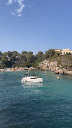 Busy summer afternoon across Mallorca's southeastern coves
