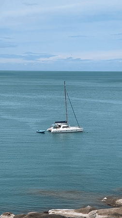 Catamaran anchored in turquoise waters off Ko Samui