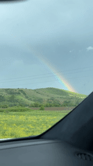 Rainbow appears over Bulgarian countryside near Dolna Malina
