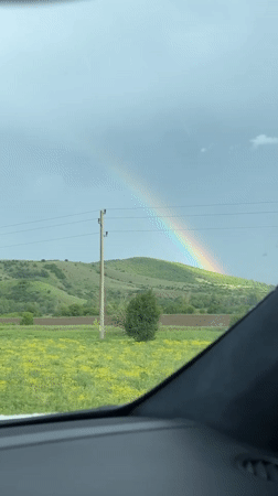 Rainbow appears over Bulgarian countryside near Dolna Malina