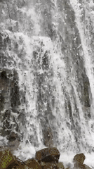 Waterfall filmed in Ukraine, camera pans from base upward