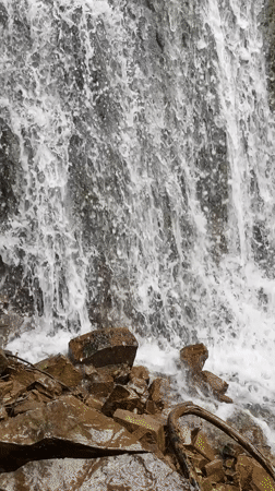 Waterfall filmed in Ukraine, camera pans from base upward