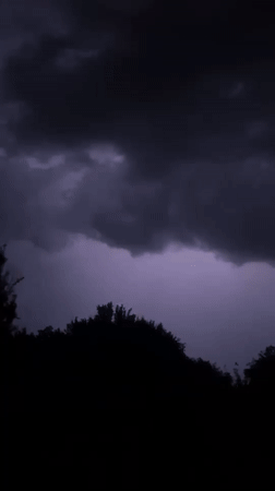 Lightning storm illuminates night sky over Kartubani, Georgia
