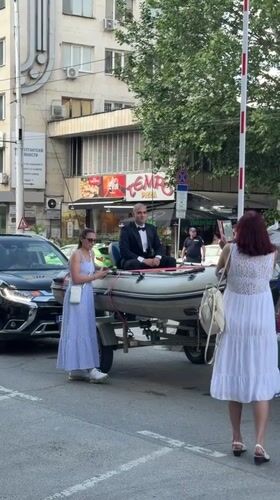 Unusual celebratory procession with suits and unconventional vehicles in Pleven