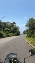 Motorcycle journey through scenic Đà Nẵng countryside captured on video