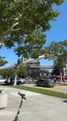 Pedestrians spotted near LA sports venues during clear evening