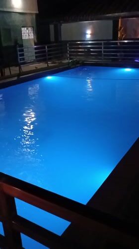 Nighttime pool and food stall scenes observed in Bauchi
