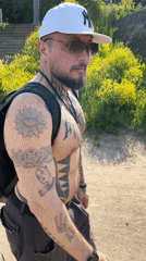 Tattooed man spotted near rustic restaurant in Saint Petersburg