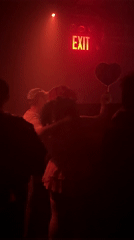 Red-lit nightclub interior captured by witnesses in NYC