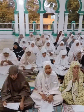 Quran study session inside a mosque in Lhokseumawe