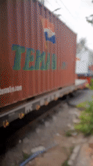 Trains, street vendors, and a clown promo in Central Jakarta