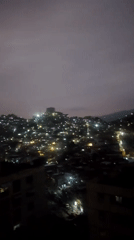 Nighttime urban scenes captured in densely populated Caracas hillside