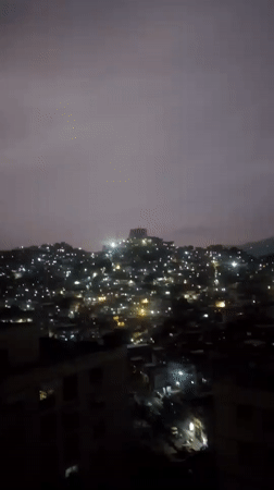 Nighttime urban scenes captured in densely populated Caracas hillside