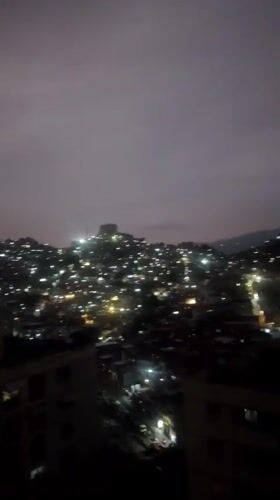 Nighttime urban scenes captured in densely populated Caracas hillside