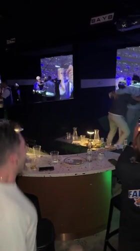 Late-night bar scene captured on shaky video in NYC
