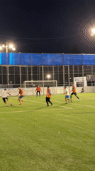 Late-night soccer match played on artificial turf in Los Angeles