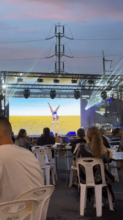 Outdoor stage event setup and performances in Wichit