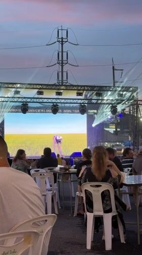 Outdoor stage event setup and performances in Wichit