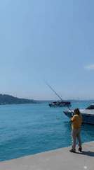 Morning fishing and boating activity along Istanbul's Bosphorus waterfront