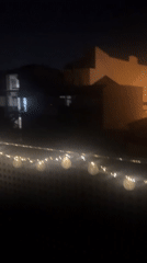 Evening moments captured in Mollet Del Vallès: balcony lights, Greek salad