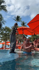 Live violin sets the vibe at a Ko Samui pool party
