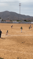 Youth baseball game draws spectators in Juan Griego, Venezuela