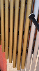 Playing with outdoor musical instruments and interactive gear panels in Irvine