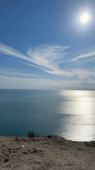 Woman takes clifftop selfie overlooking Black Sea near Supsekh