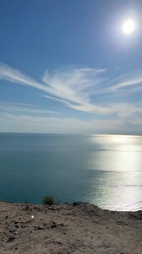 Woman takes clifftop selfie overlooking Black Sea near Supsekh