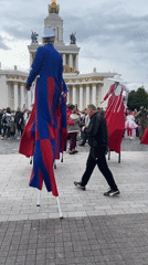 Costumed stilt performers spotted walking in Moscow