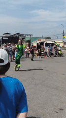 Street performers entertain a small crowd in Chaikovsky