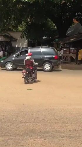 Daily street life documented around Bukuru, Nigeria roundabout
