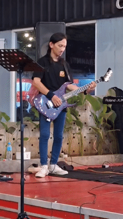 Live band performs at carwash coffee shop in Indonesia