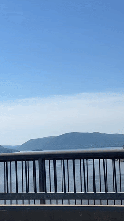 Bridge crossing captured with scenic views and construction traffic