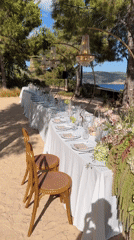 Elegant outdoor wedding reception setup in Ibiza with sea views