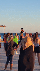 Sunset fitness class on Quarteira's seafront promenade