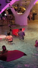 Evening festivities unfold at Kediri nightclub with pools and sculpture