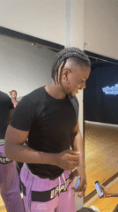Young man filmed smiling in Lekki studio setting