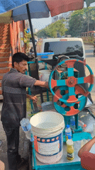 Street vendors and commuters documented in morning Dhaka activity