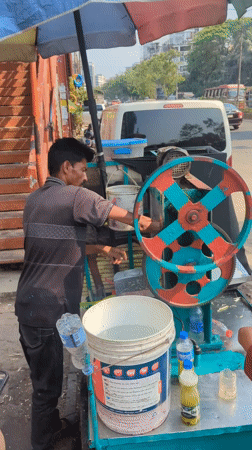 Street vendors and commuters documented in morning Dhaka activity