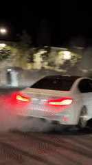 Car performs donuts for spectators in Santa Clarita