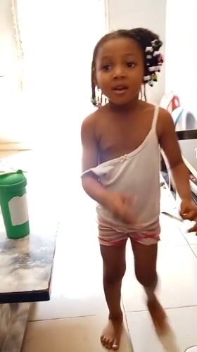 Children play with digital device in Yelwa home