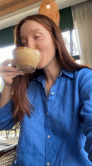 Woman enjoys morning coffee, takes selfies at Thai cafe