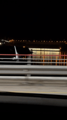 Nighttime bridge crossing captured on video in Divnogorsk, Russia