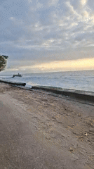 Peaceful coastal sunset captured at Nusa Penida seawall