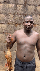 Man prepares traditional meat dishes in Rafin Bauna, Nigeria