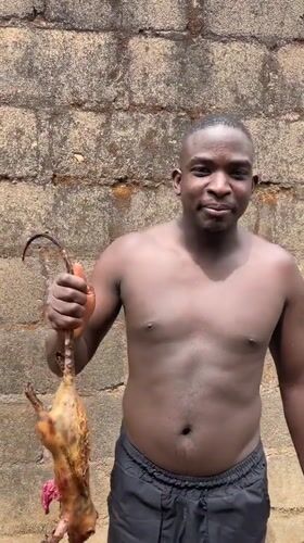 Man prepares traditional meat dishes in Rafin Bauna, Nigeria