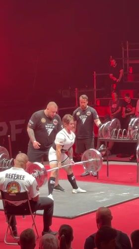 Powerlifting competition at a packed indoor arena in Khimki